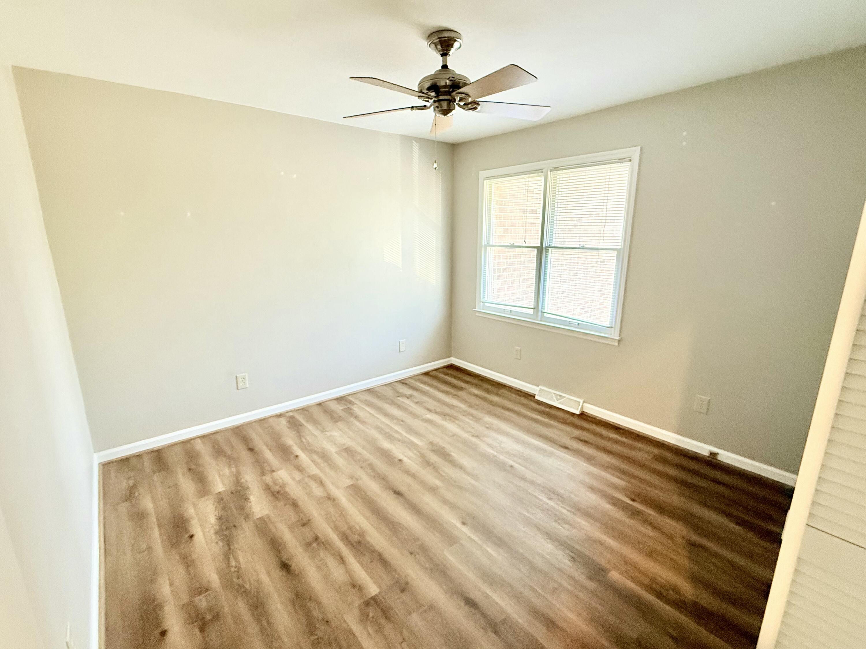 2317 Broadway Avenue Southwest, Unit E Roanoke, VA 24014 - Photo 16 of 20 a view of an empty room with a window