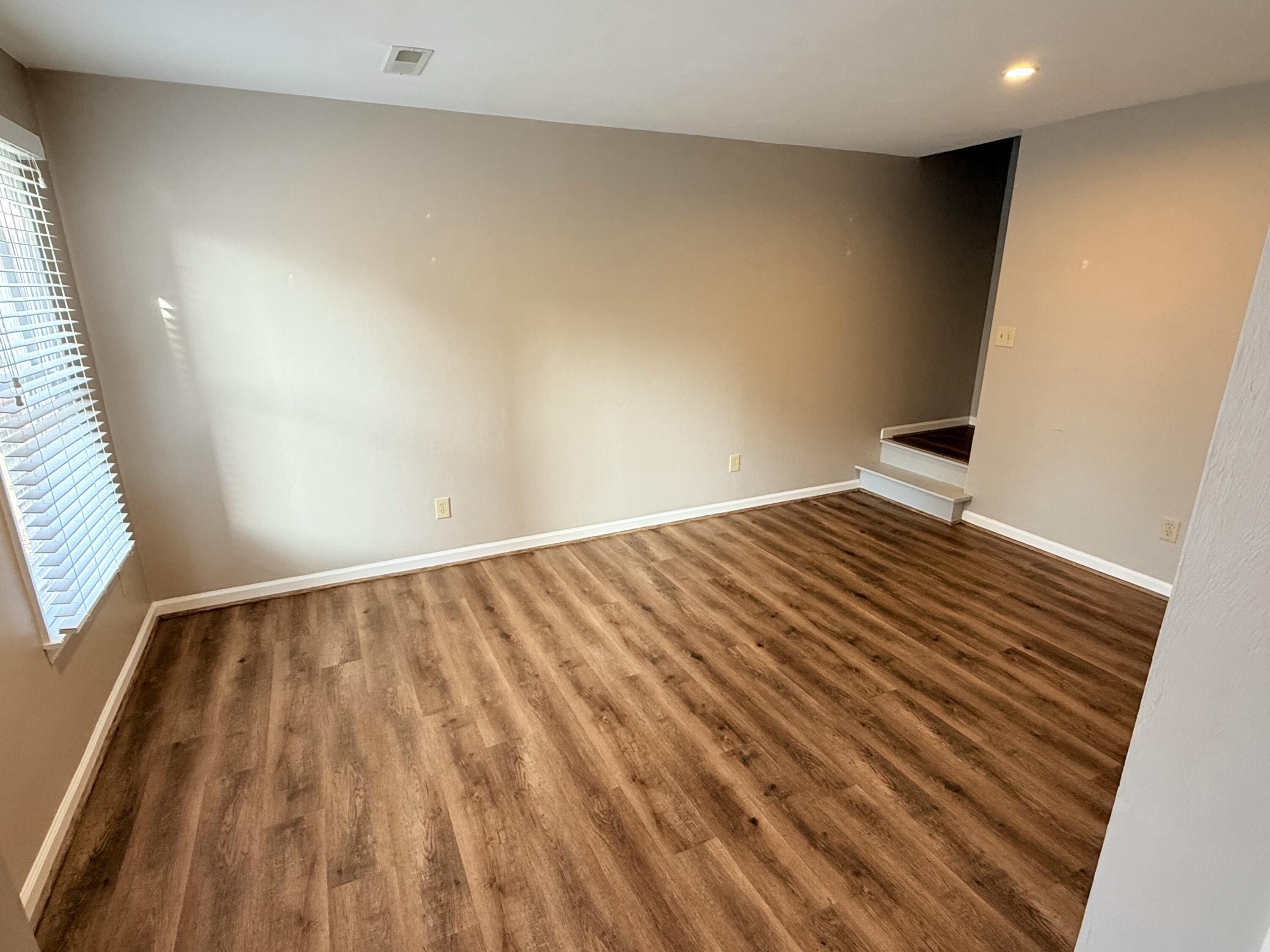 2317 Broadway Avenue Southwest, Unit E Roanoke, VA 24014 - Photo 9 of 20 a view of wooden floor in an empty room
