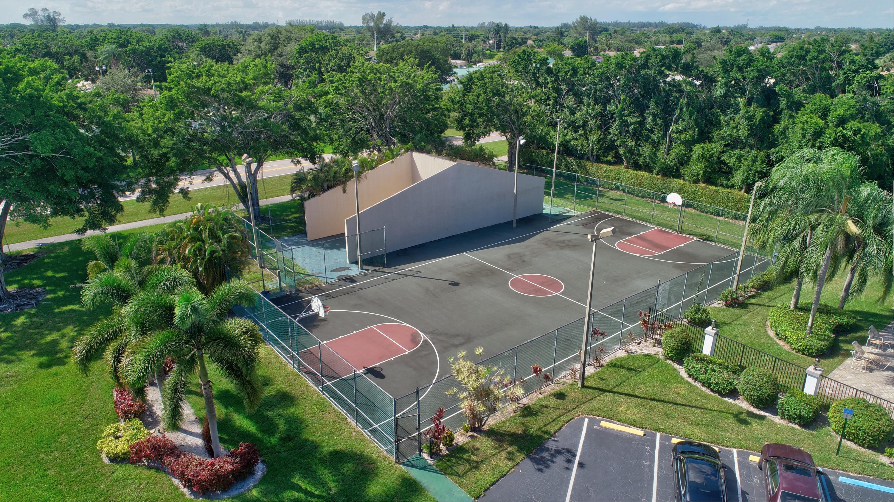 9233 Neptunes Basin Court Boca Raton, FL 33434 - Photo 28 of 31 BASKETBALL COURT