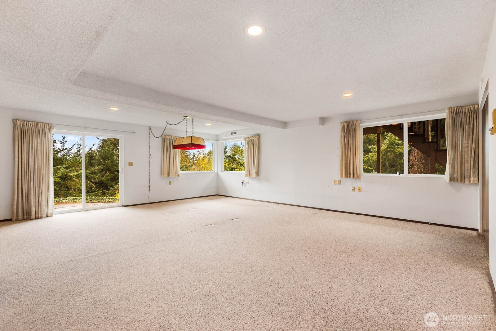 7413 Soundview Drive Edmonds, WA 98026 - Photo 24 of 31 a view of an empty room with a window