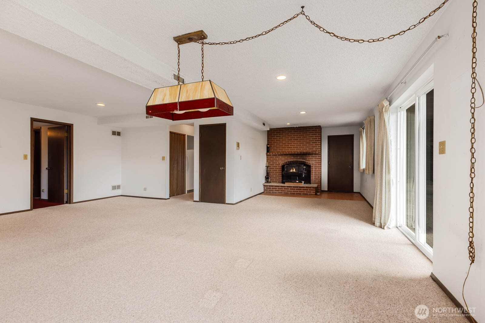 7413 Soundview Drive Edmonds, WA 98026 - Photo 25 of 31 a view of a livingroom with furniture and a window
