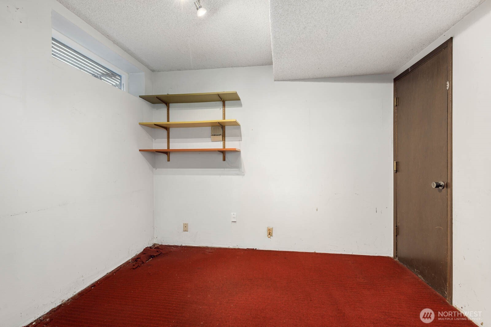 7413 Soundview Drive Edmonds, WA 98026 - Photo 30 of 31 an empty room with windows