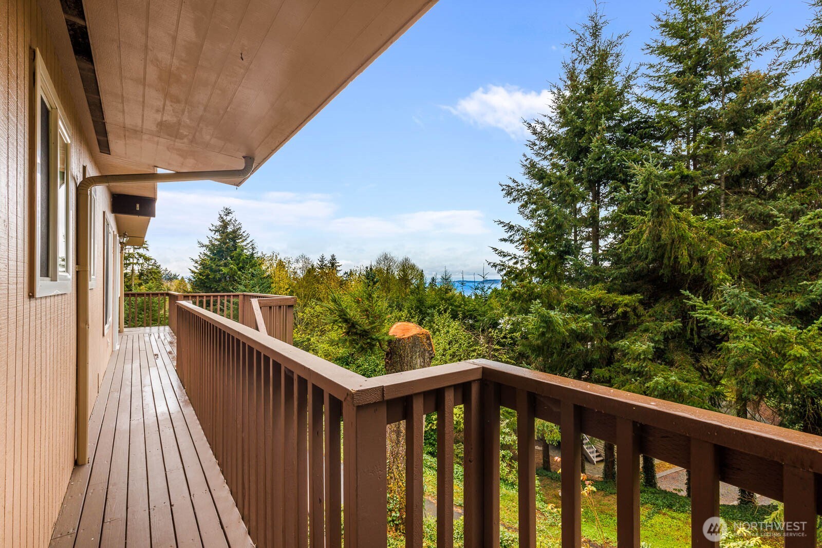 7413 Soundview Drive Edmonds, WA 98026 - Photo 6 of 31 a balcony with wooden floor and fence