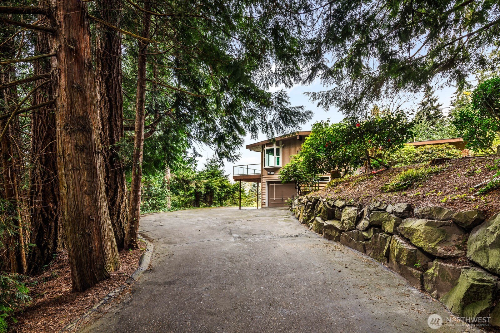 7413 Soundview Drive Edmonds, WA 98026 - Photo 7 of 31 a view of a house with a tree
