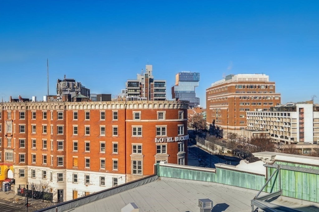 534-538 Commonwealth Avenue, Unit 7D Boston, MA 02215 - Photo 16 of 17 a view of a building with glass windows