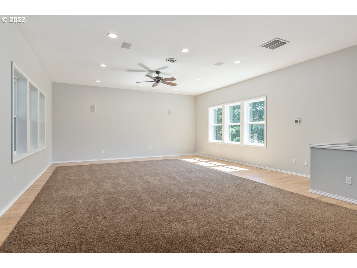 8580 Southwest Thoroughbred Place Beaverton, OR 97008 - Photo 17 of 43 a view of an empty room with a window