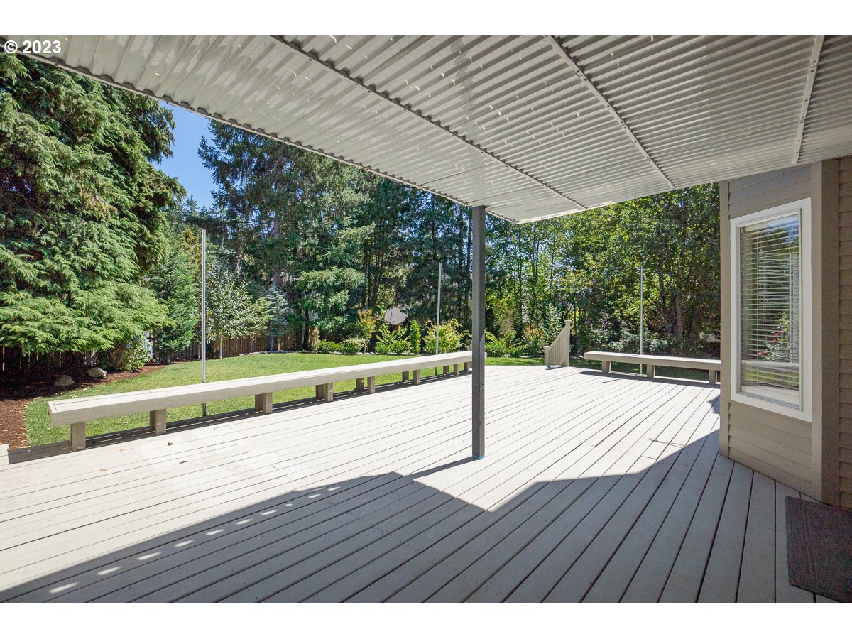8580 Southwest Thoroughbred Place Beaverton, OR 97008 - Photo 33 of 43 a wooden bench sitting on top of a wooden floor