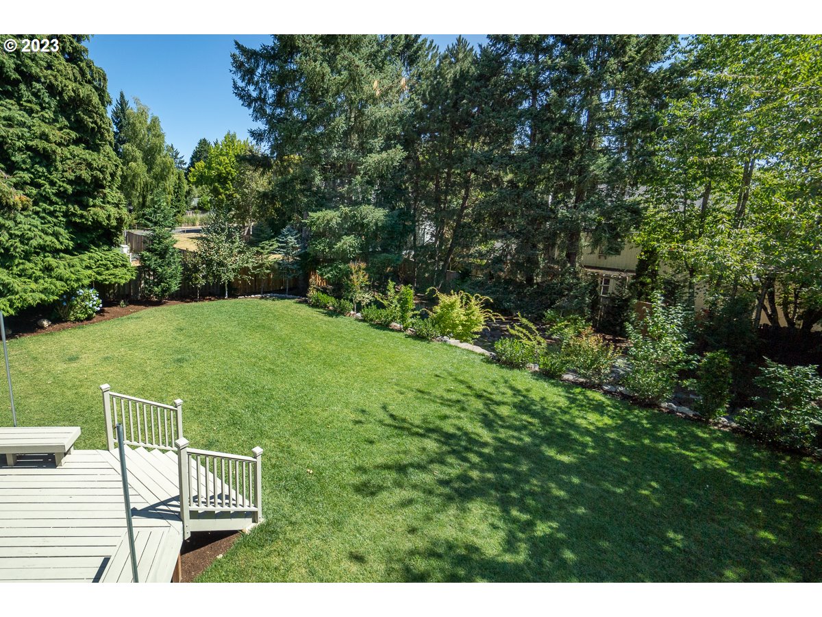 8580 Southwest Thoroughbred Place Beaverton, OR 97008 - Photo 36 of 43 a view of an outdoor space and a yard