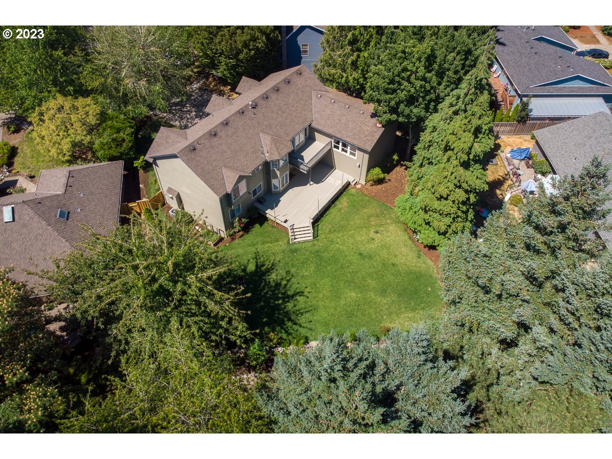 8580 Southwest Thoroughbred Place Beaverton, OR 97008 - Photo 43 of 43 an aerial view of a house with yard