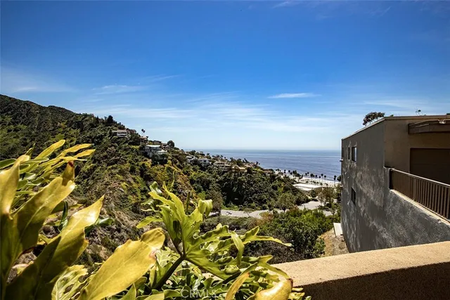 a view of a house with a street