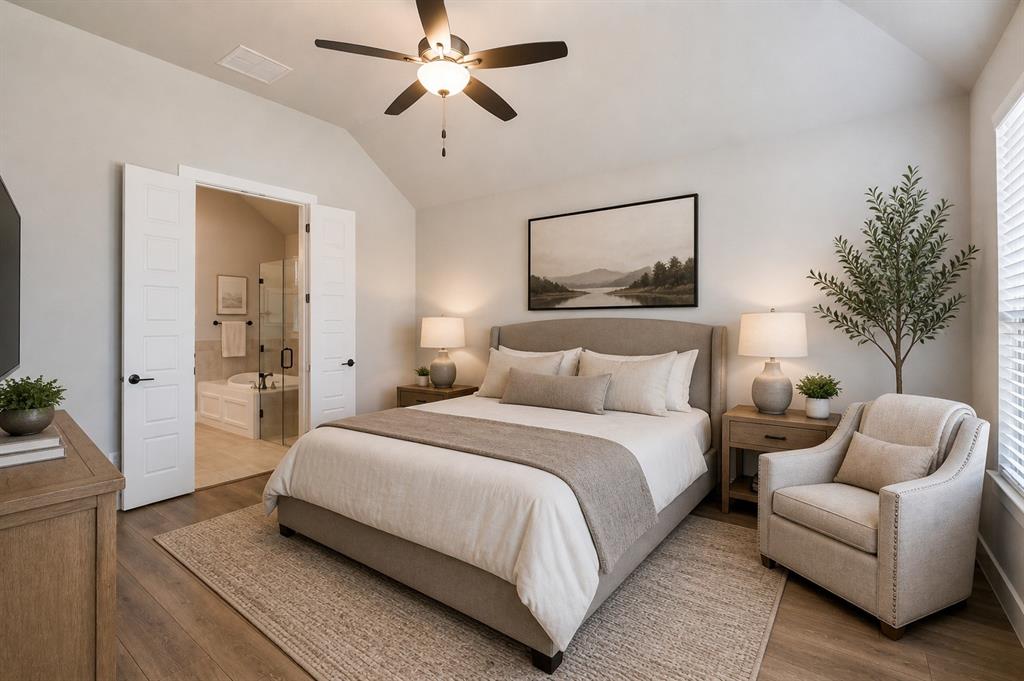 2901 Quinton Street Prosper, TX 75078 - Photo 12 of 27 a spacious bedroom with a bed couch and a potted plant