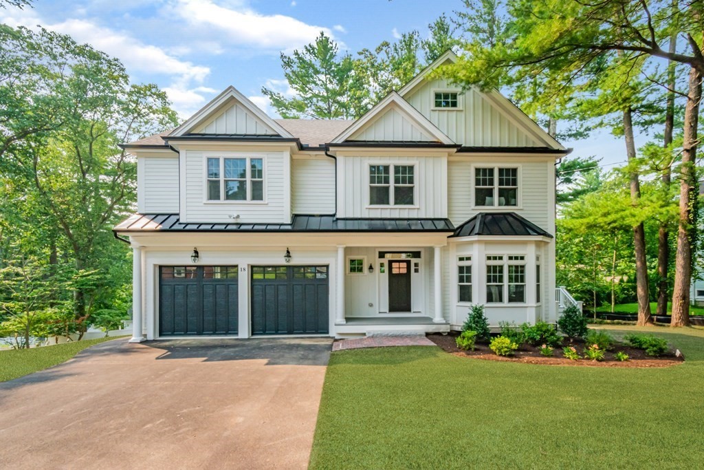 18 Pine Knoll Road Lexington, MA 02420 - Photo 1 of 42 a front view of a house with a yard