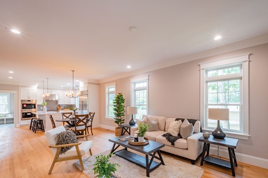 18 Pine Knoll Road Lexington, MA 02420 - Photo 11 of 42 a living room with furniture and a table