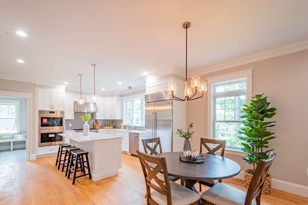 18 Pine Knoll Road Lexington, MA 02420 - Photo 14 of 42 a kitchen with a table and chairs in it