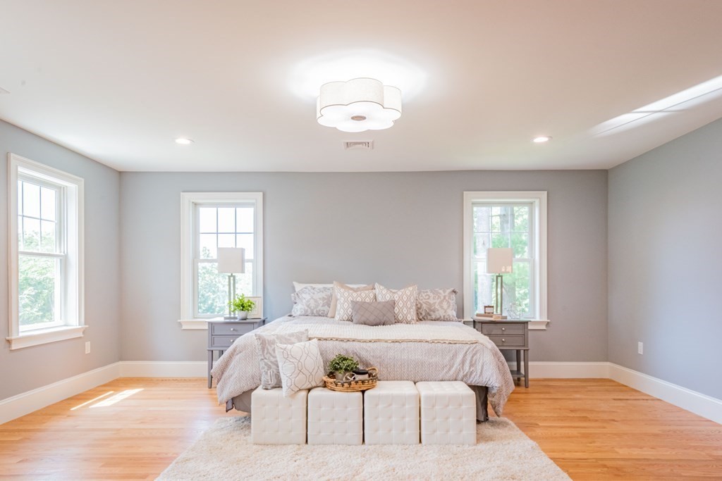 18 Pine Knoll Road Lexington, MA 02420 - Photo 24 of 42 a bedroom with a large bed and a window