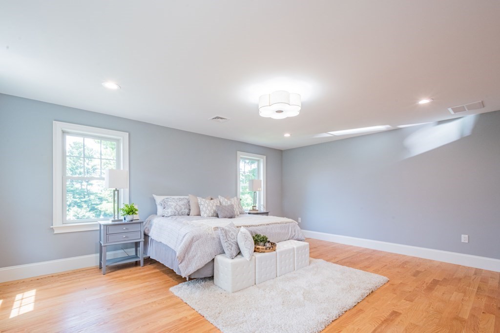 18 Pine Knoll Road Lexington, MA 02420 - Photo 25 of 42 a bedroom with a bed and window