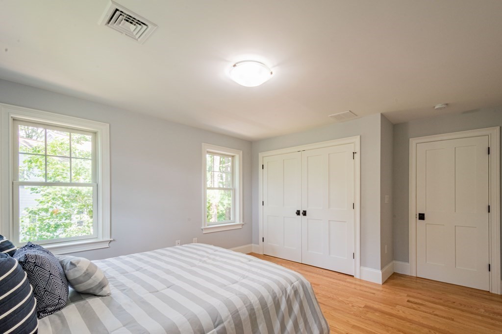 18 Pine Knoll Road Lexington, MA 02420 - Photo 32 of 42 a bedroom with a bed and a window