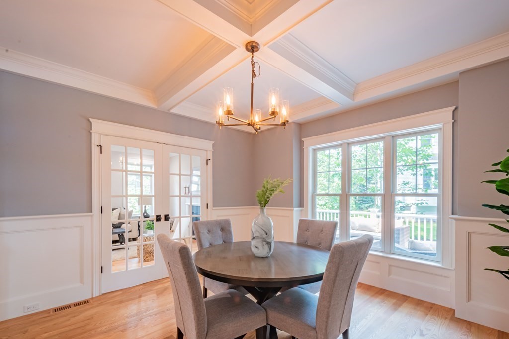 18 Pine Knoll Road Lexington, MA 02420 - Photo 6 of 42 a view of a dining room with furniture window and wooden floor