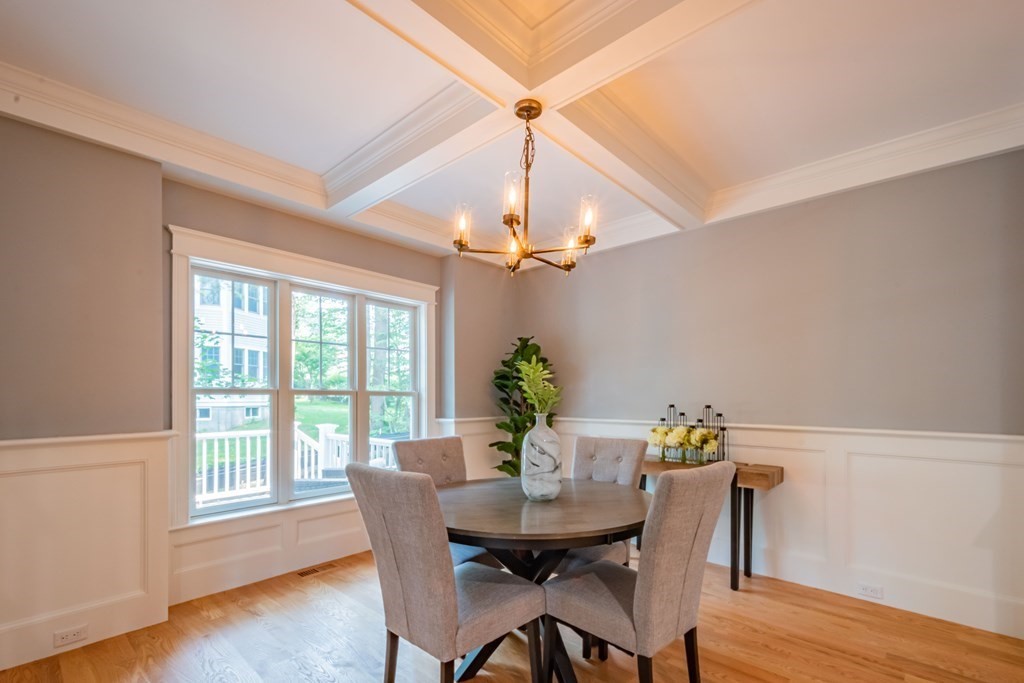 18 Pine Knoll Road Lexington, MA 02420 - Photo 7 of 42 a view of a dining room with furniture window and wooden floor