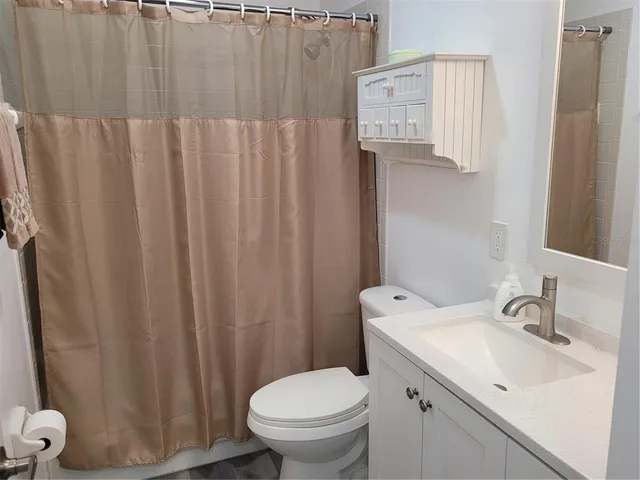 a bathroom with a sink and a toilet
