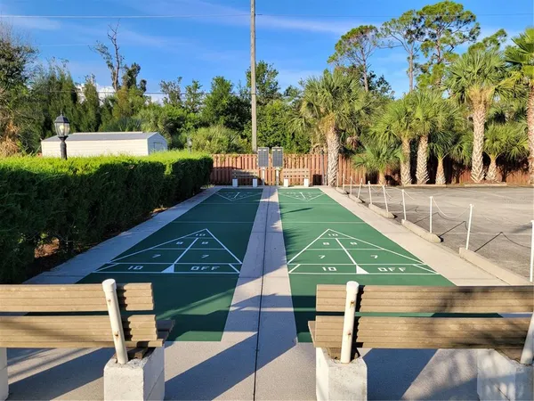 a view of a chairs and table in the room