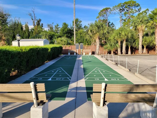 a view of a chairs and table in the room