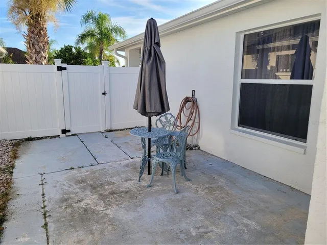 a view of a dinning room with chairs