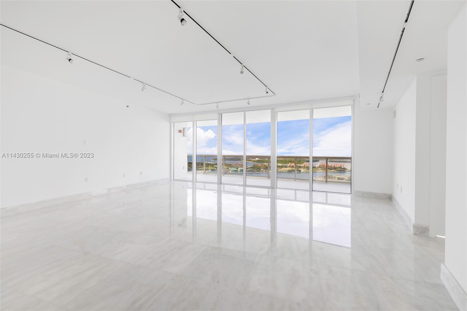 400 Alton Road, Unit 3403 Miami Beach, FL 33139 - Photo 15 of 34 a view of an empty room with a window