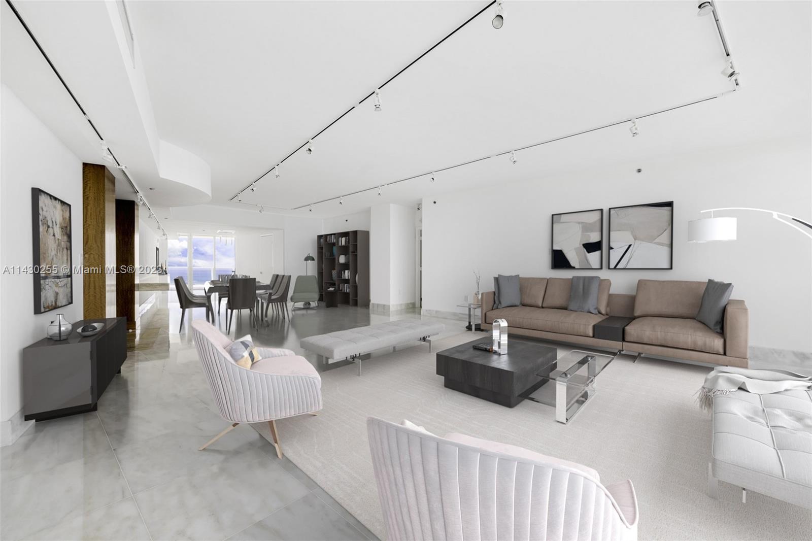 400 Alton Road, Unit 3403 Miami Beach, FL 33139 - Photo 3 of 34 a living room with furniture and a table