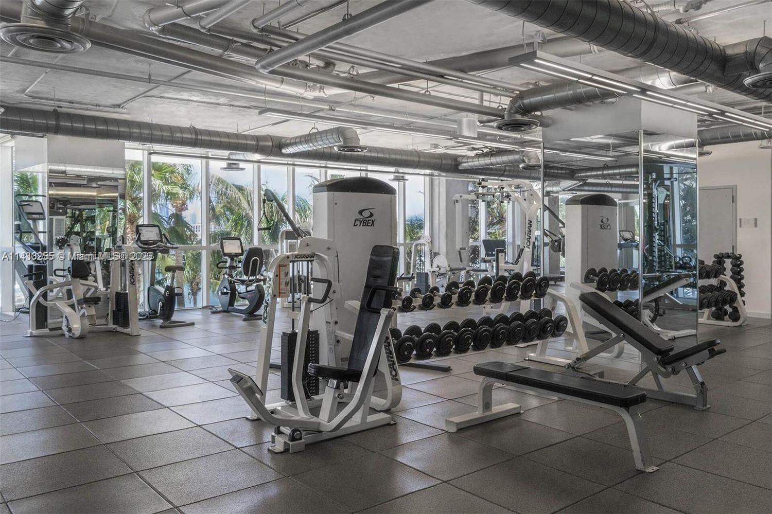 400 Alton Road, Unit 3403 Miami Beach, FL 33139 - Photo 31 of 34 a view of a room with gym equipment