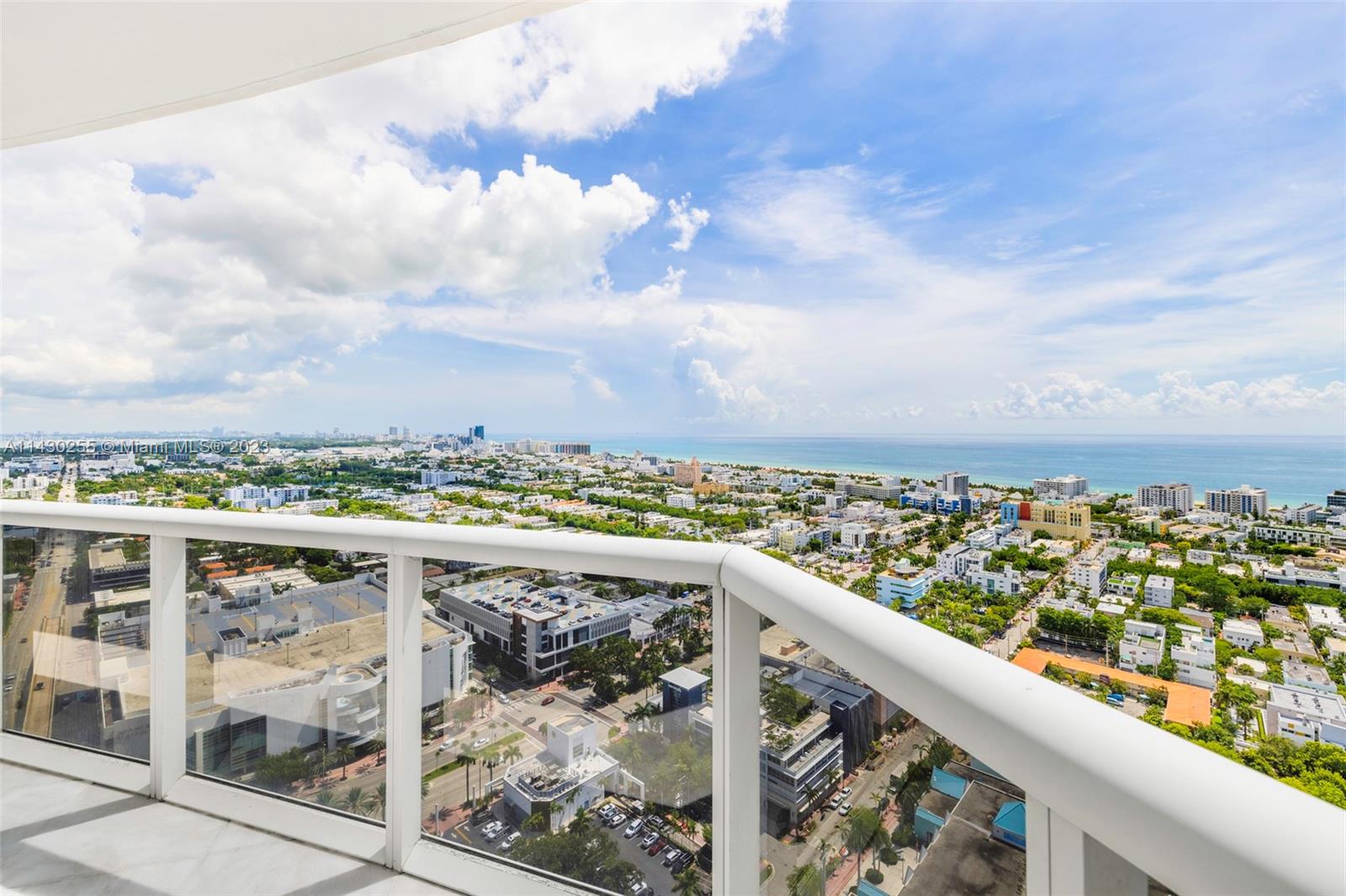 400 Alton Road, Unit 3403 Miami Beach, FL 33139 - Photo 8 of 34 a view of a city from a balcony