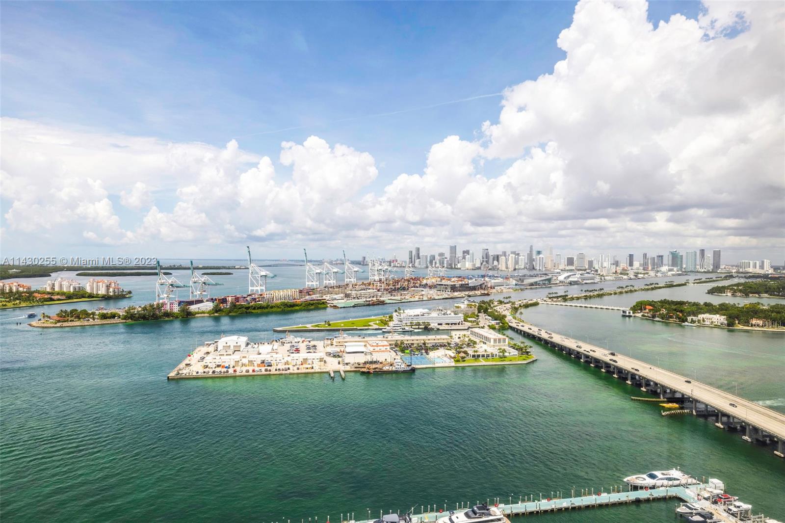 400 Alton Road, Unit 3403 Miami Beach, FL 33139 - Photo 10 of 34 a view of a lake with a city