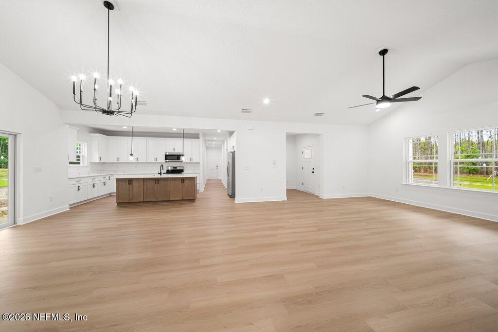 2318 Steel Bridge Road Macclenny, FL 32063 - Photo 13 of 39 a view of a kitchen with a sink and cabinet area