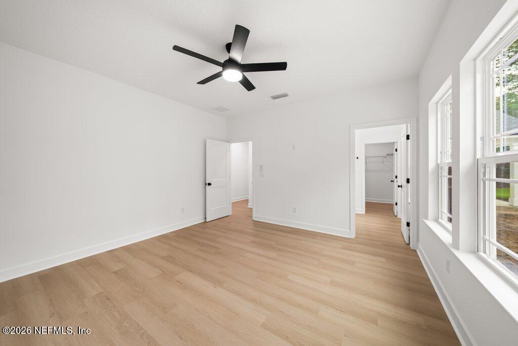 2318 Steel Bridge Road Macclenny, FL 32063 - Photo 20 of 39 a view of a livingroom with a ceiling fan and window