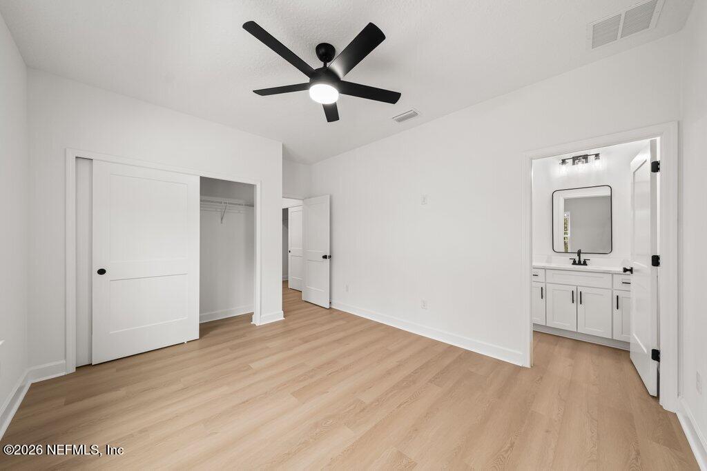 2318 Steel Bridge Road Macclenny, FL 32063 - Photo 26 of 39 wooden floor in an empty room