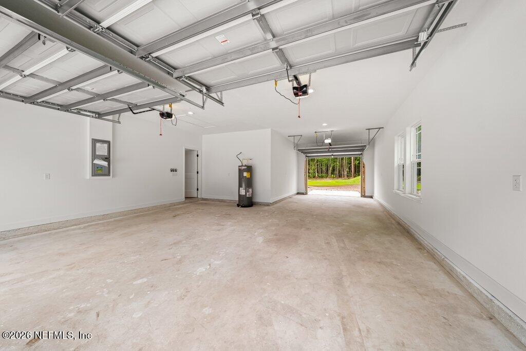 2318 Steel Bridge Road Macclenny, FL 32063 - Photo 35 of 39 a view of a hallway with a garage