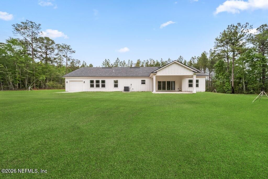 2318 Steel Bridge Road Macclenny, FL 32063 - Photo 36 of 39 a house view with a garden space
