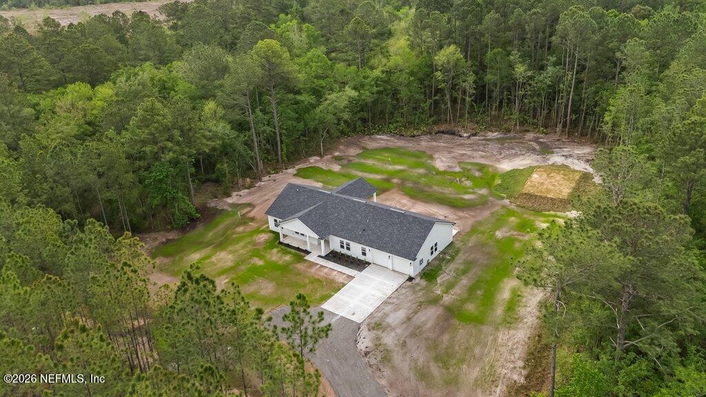 2318 Steel Bridge Road Macclenny, FL 32063 - Photo 38 of 39 view of a yard with swimming pool