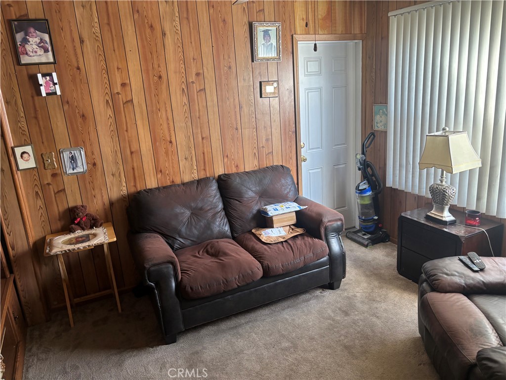 2403 West 116th Street Hawthorne, CA 90250 - Photo 6 of 15 a living room with furniture and a window