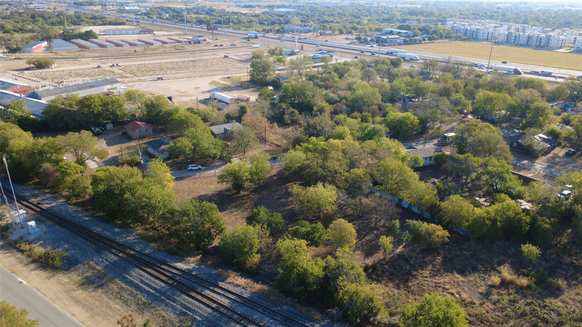 25 Cortez Street Kyle, TX 78640 - Photo 13 of 13 Aerial view of property and surrounding area featuring a main thoroughfare