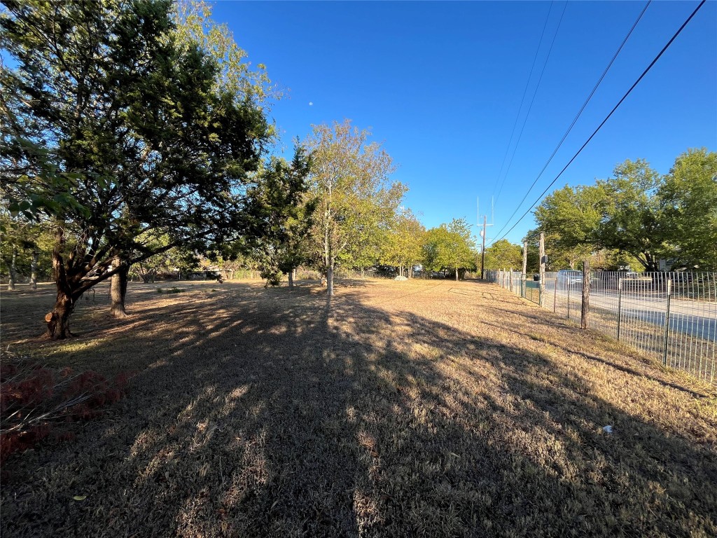 25 Cortez Street Kyle, TX 78640 - Photo 7 of 13 a view of dirt yard with a tree