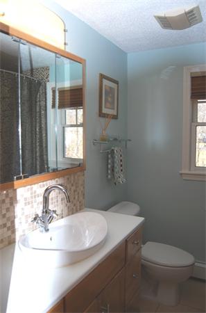 49 Dix Rd Extension Woburn, MA 01801 - Photo 11 of 19 a bathroom with a sink toilet and shower