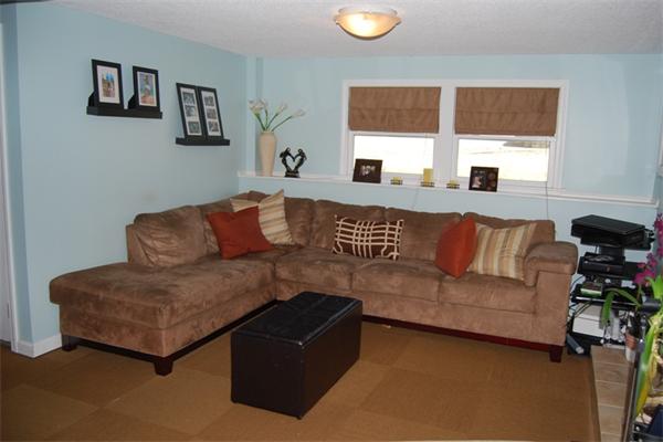 49 Dix Rd Extension Woburn, MA 01801 - Photo 13 of 19 a living room with furniture and a window