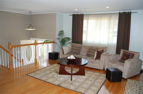 49 Dix Rd Extension Woburn, MA 01801 - Photo 2 of 19 a living room with furniture and a window