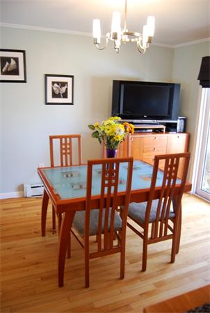 49 Dix Rd Extension Woburn, MA 01801 - Photo 4 of 19 a dining room with furniture a chandelier and wooden floor