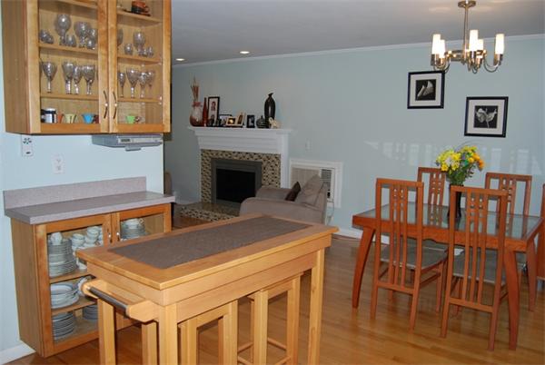 49 Dix Rd Extension Woburn, MA 01801 - Photo 5 of 19 a view of a dining room with furniture and wooden floor