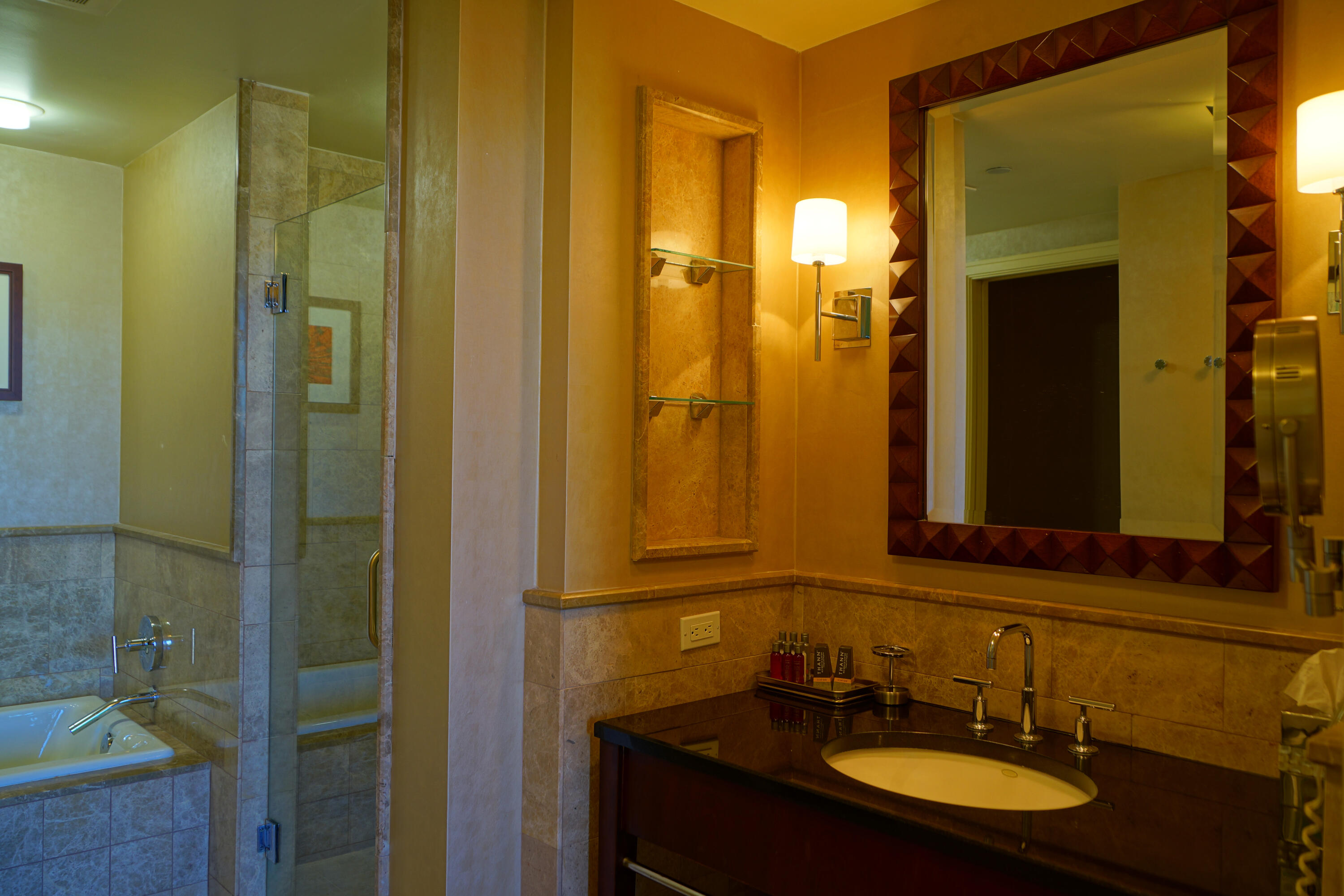 3800 North Ocean Drive, Unit 1703 Singer Island, FL 33404 - Photo 12 of 19 a bathroom with a sink and a mirror
