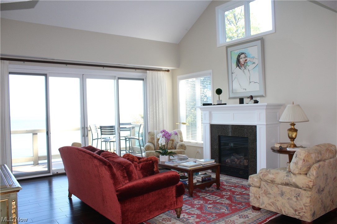 122 Turtle Bay Huron, OH 44839 - Photo 12 of 31 Living room featuring dark hardwood flooring and vaulted ceiling high