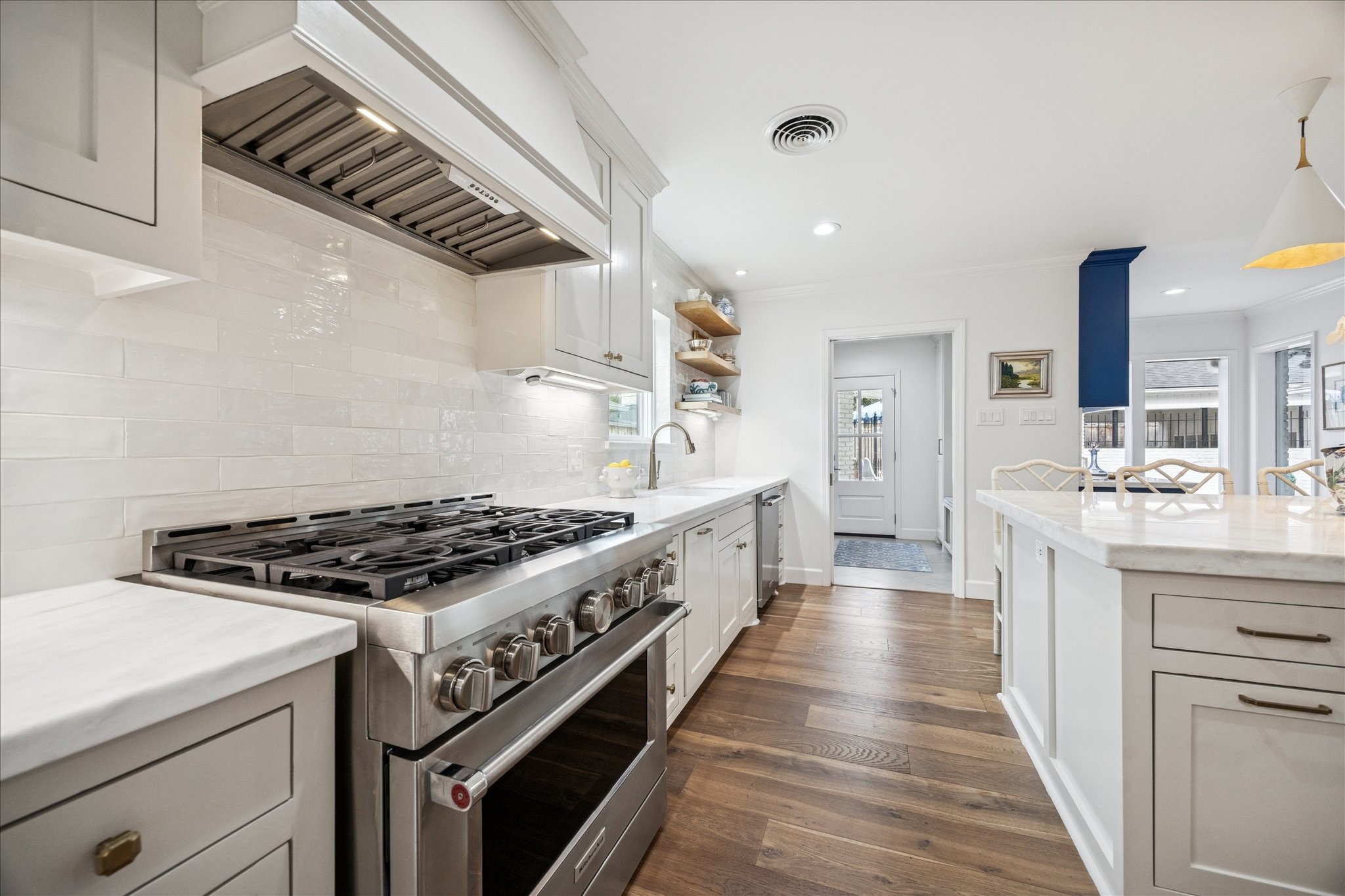 7906 Meadowbriar Lane Houston, TX 77063 - Photo 16 of 34 Six burner KitchenAid gas range with oven.