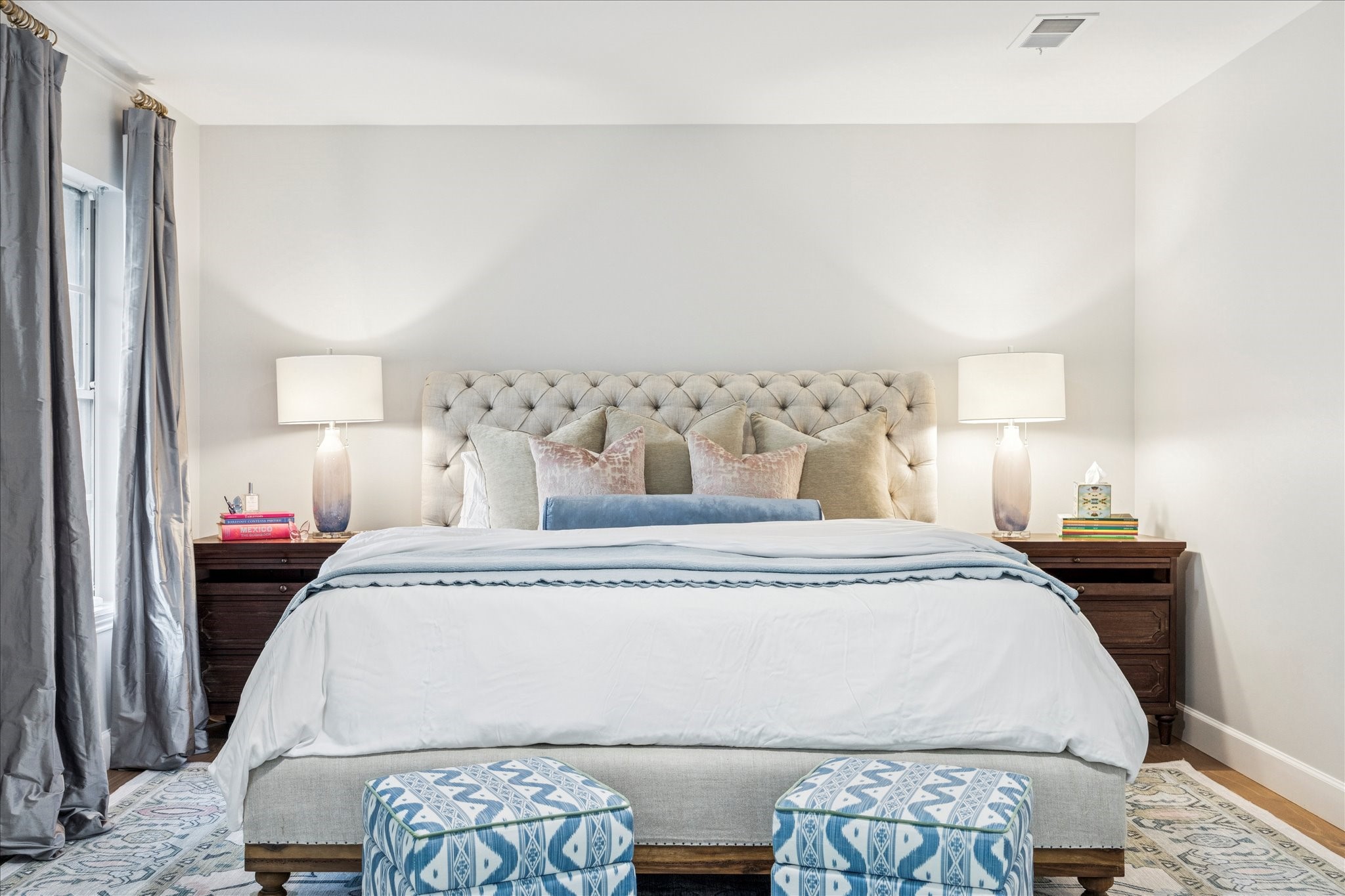 7906 Meadowbriar Lane Houston, TX 77063 - Photo 19 of 34 The primary bedroom is located in the back of the home and features a large window and french doors opening to the patio and pool. It's the perfect private retreat!